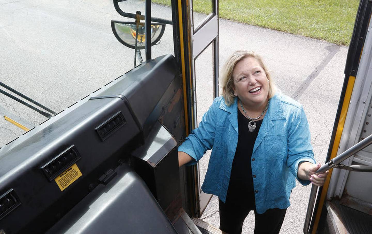 Regional School Superintendent Leslie Schermerhorn speaks with a school bus driver on Aug. 25, 2016.  “The student enrollment is fluctuating greatly in different communities, and it’s time to be strategic about that,” Schermerhorn said. “Which buildings we’re going to keep, how we can best use the buildings – that kind of thing.”