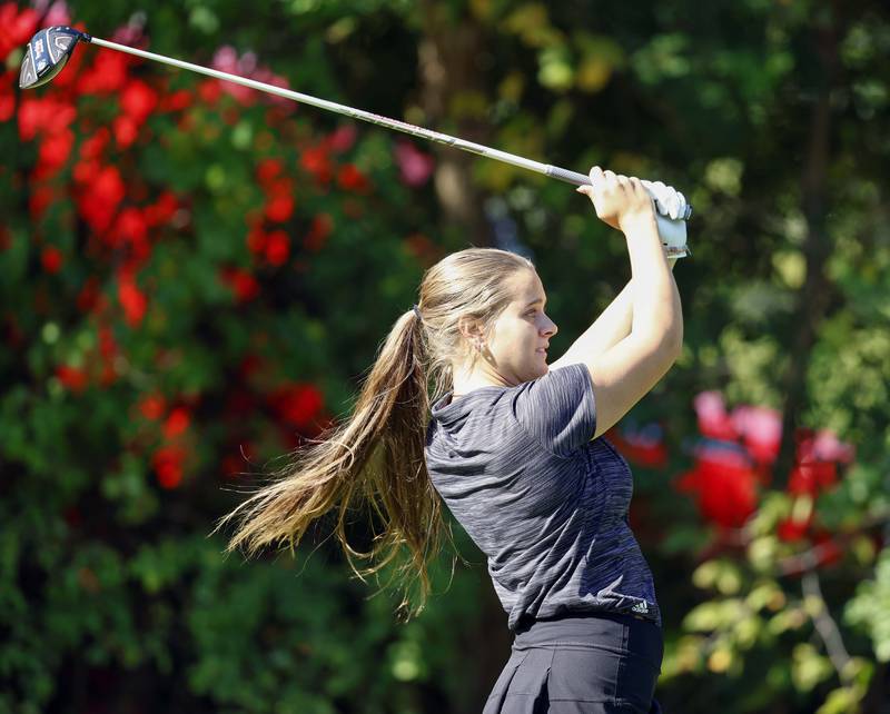 Kate Bruhl of Glenbard South, watches her drive during the IHSA Class 2A West Chicago girls golf regional at St. Andrews Tuesday, Oct. 1, 2024 in West Chicago.