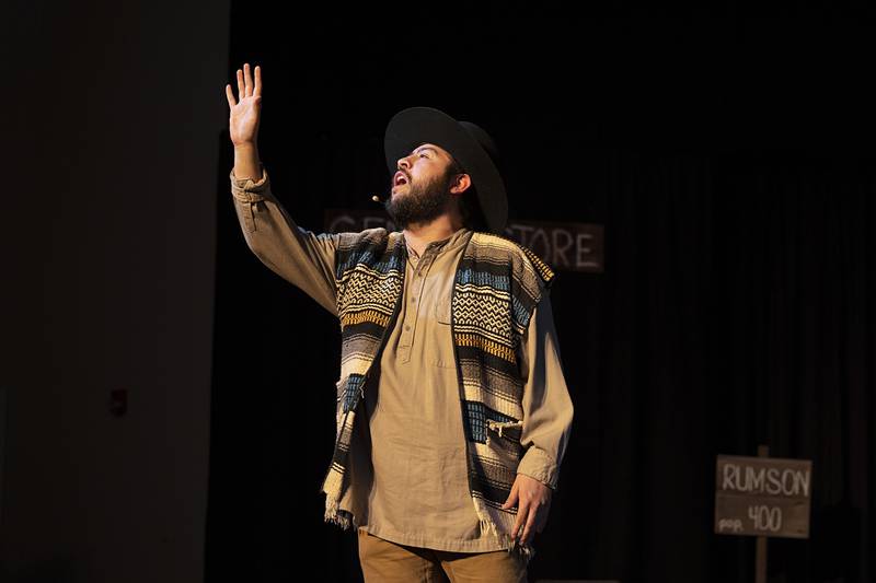 Brian Guin, playing the part of Julio Valderez, rehearses a song for PAG’s “Paint Your Wagon” on Monday, April 13, 2026.