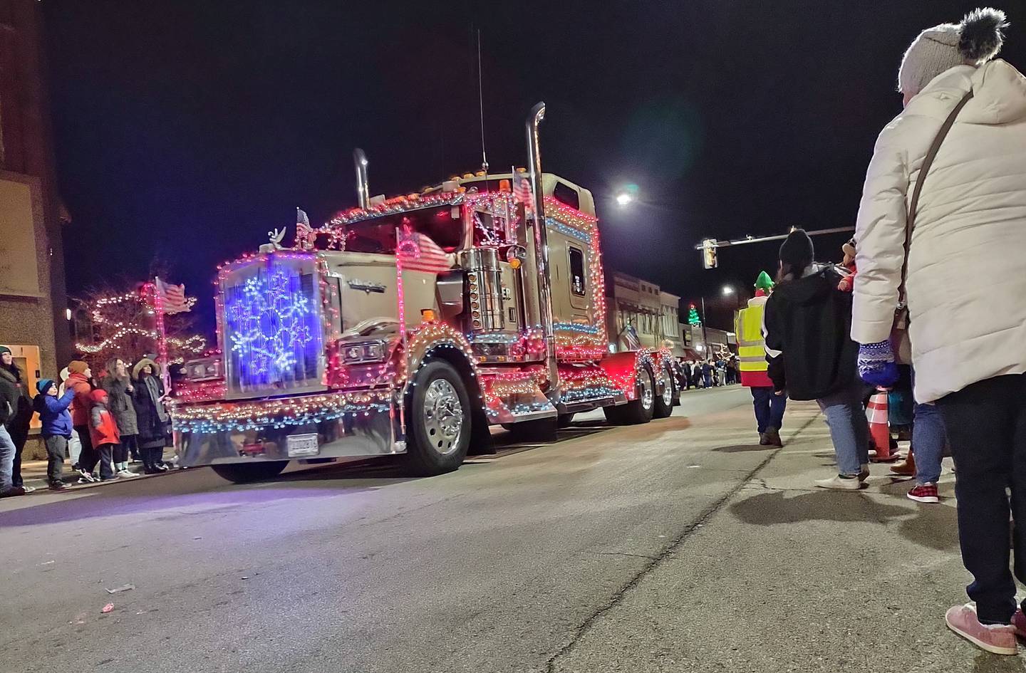 A lighted semi-tractor makes its way through downtown Streator during Keeping Christmas Close to Home's Lighted parade Saturday, Nov. 27, 2021.