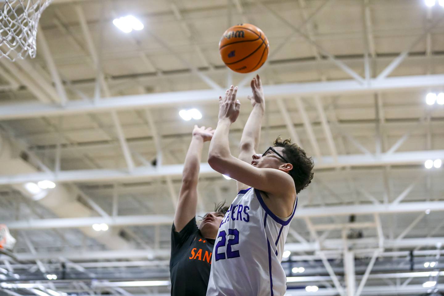 Plano's Jayden Zepeda (22) puts up a shot during their basketball game between Sandwich at Plano Tuesday, Dec 9, 2025 in Plano.