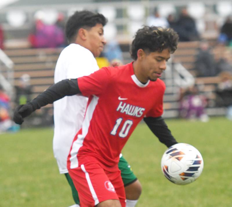 Oregon's Eduardo Munoz Garcia (10) plays the ball against a North Boone player on Tuesday, Oct. 21, 2025 at the 1A Byron Regional.