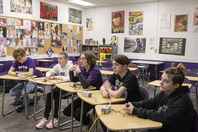 Dixon team members Hayden Fulton (left), Aaron Conderman, Thomas Stauter, Christopher Wadsworth and Oliver Payne practice for scholastic bowl regionals Thursday, March 2, 2023 at Dixon High School.