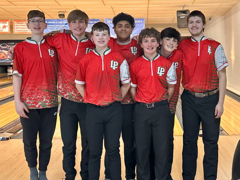 L-P boys bowlers (from left) Andrew Olivero, Zach Quick, Grady Sandor, Monti Lorenzi, Joey Patyk, Aidan McCray and Emerson Vasquez pose for a photo on Friday, Jan. 17 in Channahon after placing third at the Minooka Regional to advance as a team to the sectional.