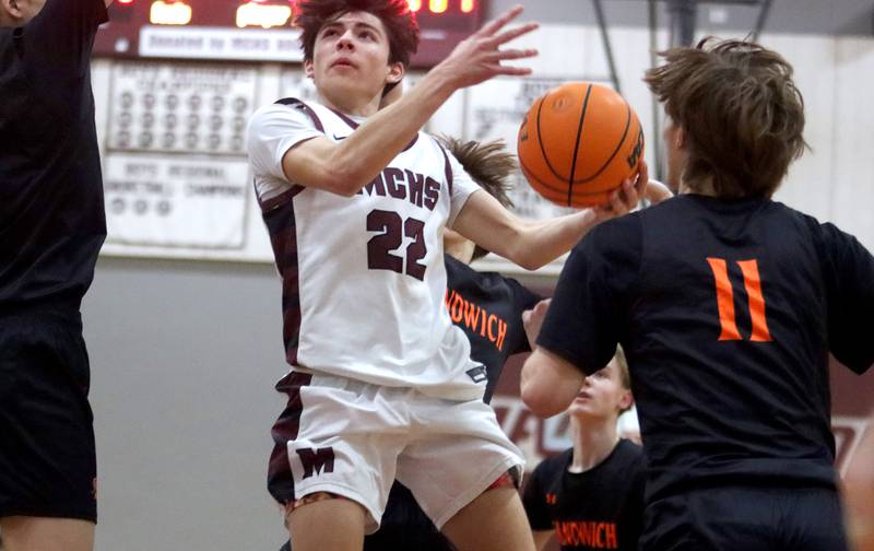 Marengo’s Nick Jacobi works under the net against Sandwich in varsity boys basketball action on Saturday, Jan..24, 2025, at Marengo High School in Marengo.