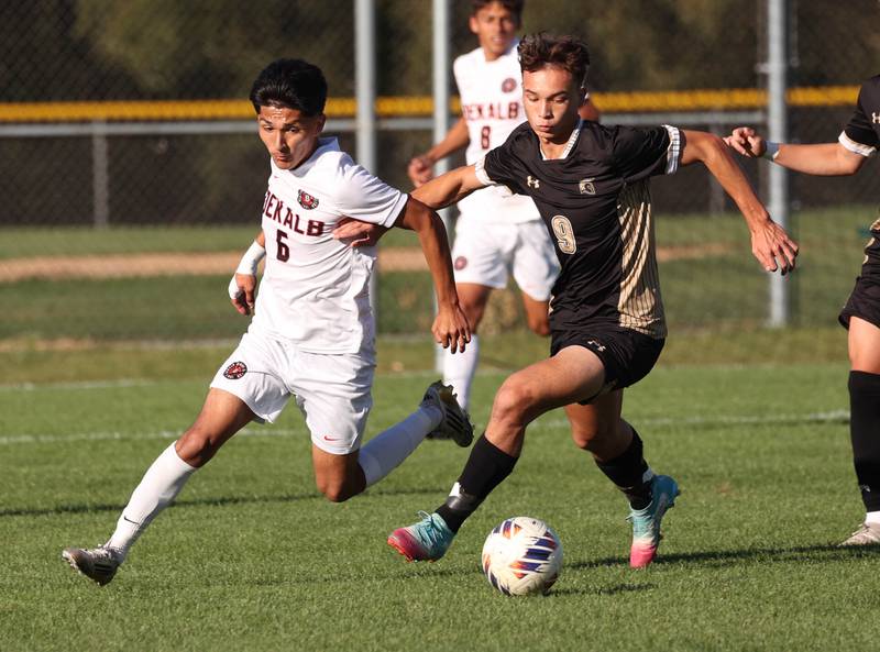 DeKalb's Mauricio Jasso and Sycamore's Felix Arends go after a loose ball during the El Classicorn rivalry game Tuesday, Oct. 7, 2025, at Sycamore High School.
