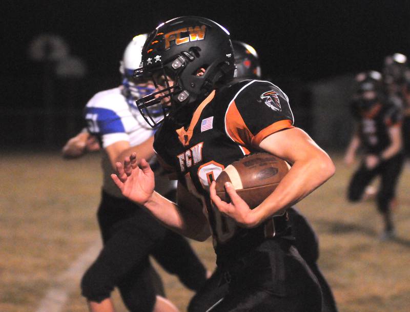 FCW running back Payton Quaintance (10) heads upfield against Blue Ridge at the Wood Shed on Friday, Oct. 7, 2022, in rural Streator.