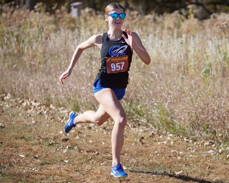 Burlington Central's Abigail Burke heads for the finish line at the Fox Valley Conference meet on Saturday, Oct. 19,2024 at Hickory Nut Grove Preserve in Cary.