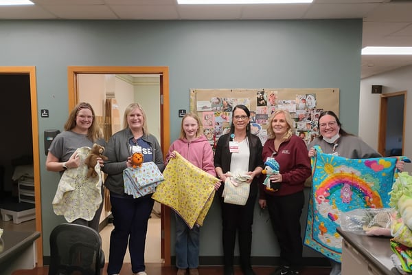 Ogle County 4‑H youths donate to 3 local organizations