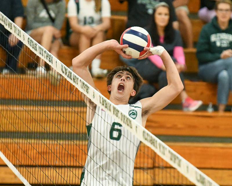 Glenbard West's Jack Anderson (6) set the ball during the game while taking on Oak Park-River Forest on Tuesday April 16, 2024, held at Glenbard West High School.