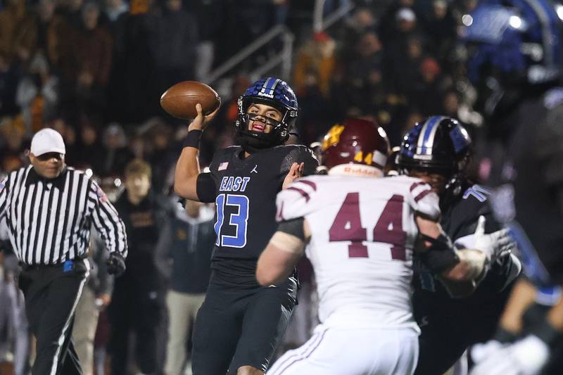Lincoln-Way East’s Jonas Williams connects with Zion Gist for a touchdown against Loyola in the Class 8A semifinal on Saturday, Nov. 23, 2024 in Frankfort.