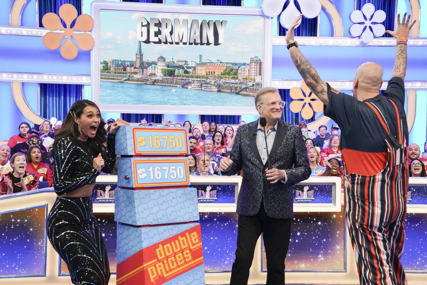 "Jackpot January / Super Bowl Special" -- Coverage of the CBS Original Series THE PRICE IS RIGHT, scheduled to air on the CBS Television Network.  Pictured: Alexis Gaube and Drew Carey. Photo: Michael Yarish/CBS ©2024 CBS Broadcasting, Inc. All Rights Reserved.