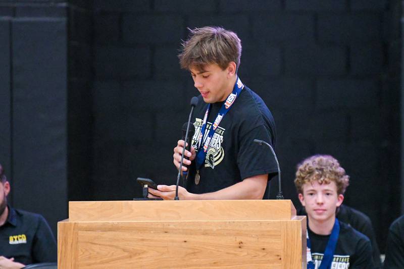 Sycamore’s Discus thrower Dylan Weides talks during the pep rally on Tuesday June 4, 2025, at Sycamore High School after the team brought back the championship trophy.