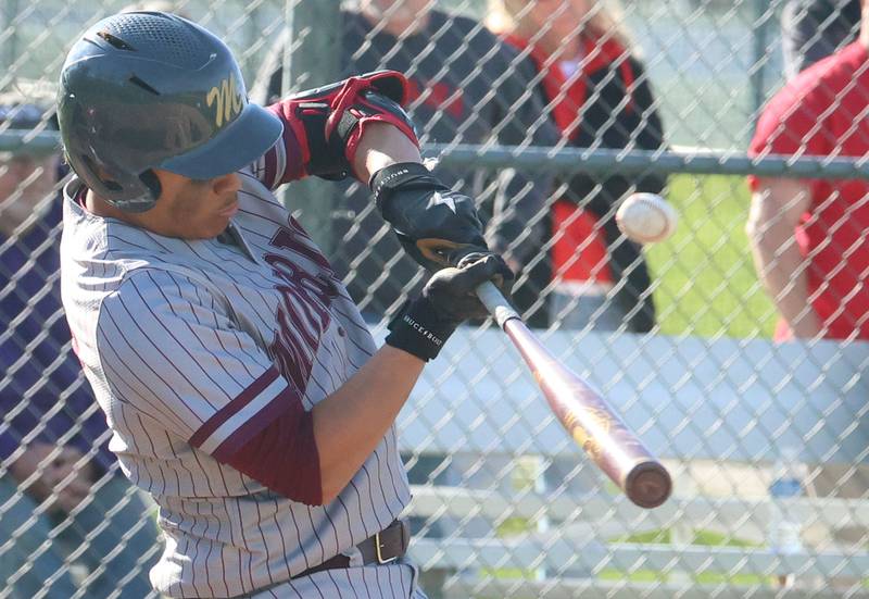 Morris's Bryce Lee blasts a hit against Ottawa on Monday, April 20, 2026 at Ottawa High School.