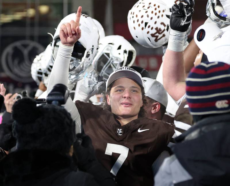 Mount Carmel's Emmett Dowling celebrates Wednesday, Dec. 3, 2025, after their win over Oswego in the IHSA Class 8A state chamionship game in Huskie Stadium at Northern Illinois University in DeKalb.