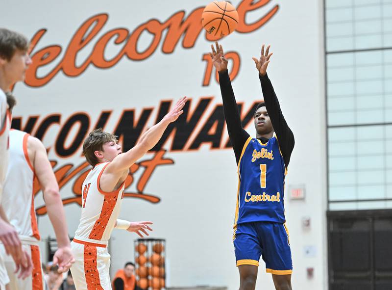 Joliet Central's Bernal Fox (1) shoots three point basket during the 4A Lockport Regional game against Lincoln-Way West on Monday, FEB. 23, 2026, at New Lenox.
