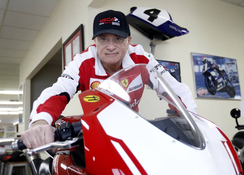 Jeff Schwartz on his Ducati motorcycle on Tuesday, Dec. 27, 2022, at his garage in McCullom Lake. He set numerous land speed records last year with his motorcycle and Ferrari.