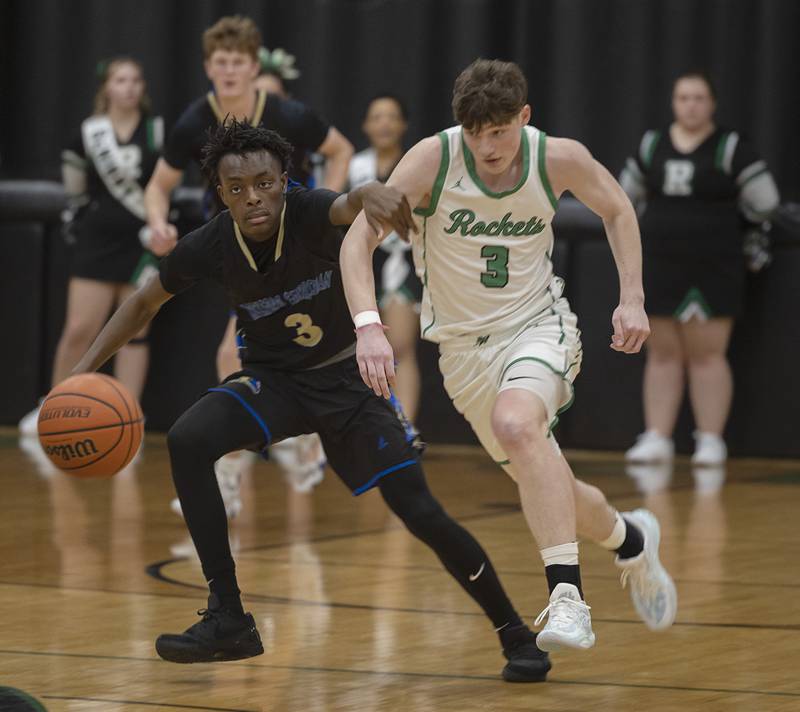 Rock Falls’ Ryken Howard and Rockford Christian’s JT Samuels run after a loose ball Tuesday, Jan. 30, 2024 at Rock Falls High School.