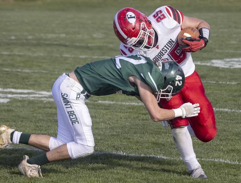 Forreston's running back Johnathen Kobler (25) is tackled by St. Bede's Evan Entrican (42) during the Class 1A first round playoff game on Saturday, Oct. 29, 2022 at the Academy in Peru.