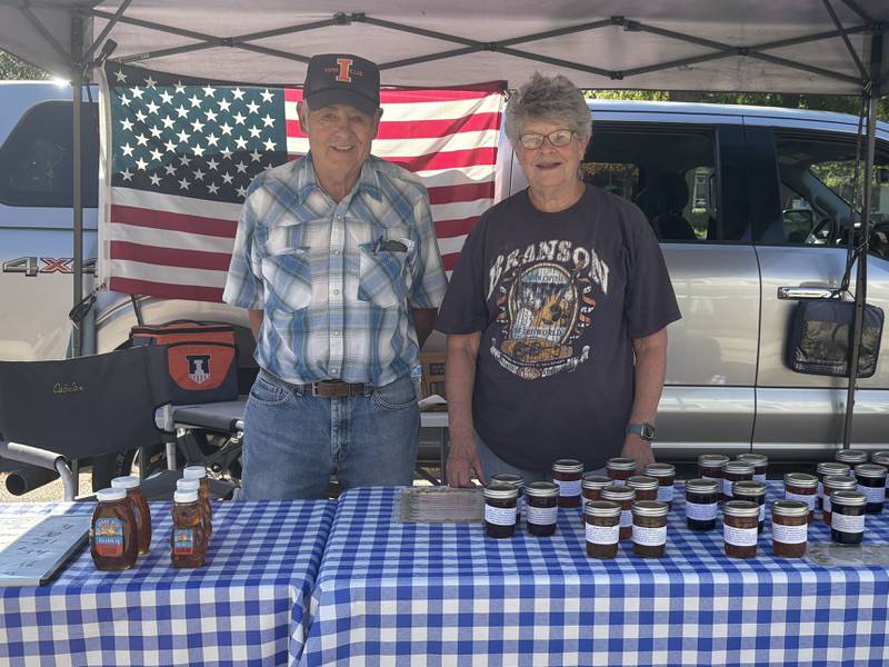 Wayne Workowski, left, and Linda Allen pictured at the Huntley Farmers Market Oct. 4, 2025.