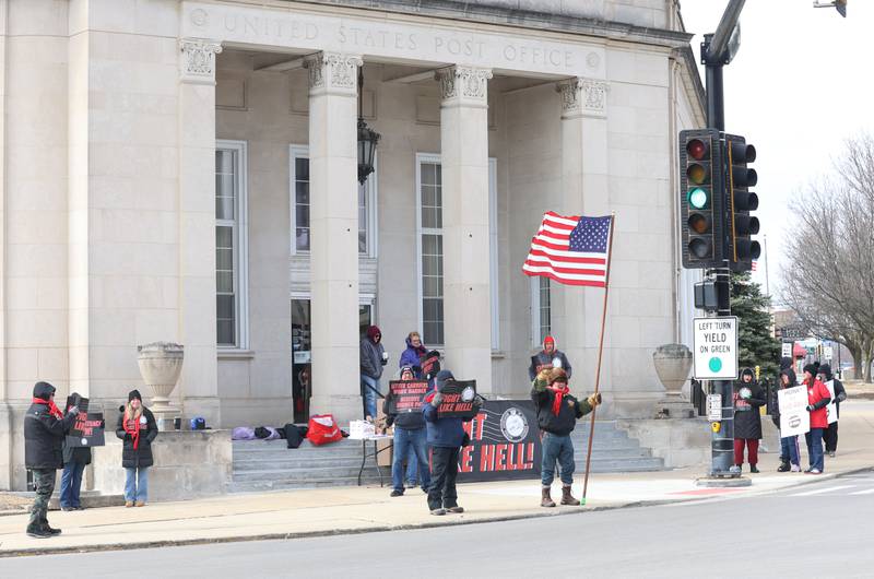 Letter carriers hold a “Fight Like Hell” rally on Sunday, Feb. 22, 2026 at the United States Post Office in Peru.