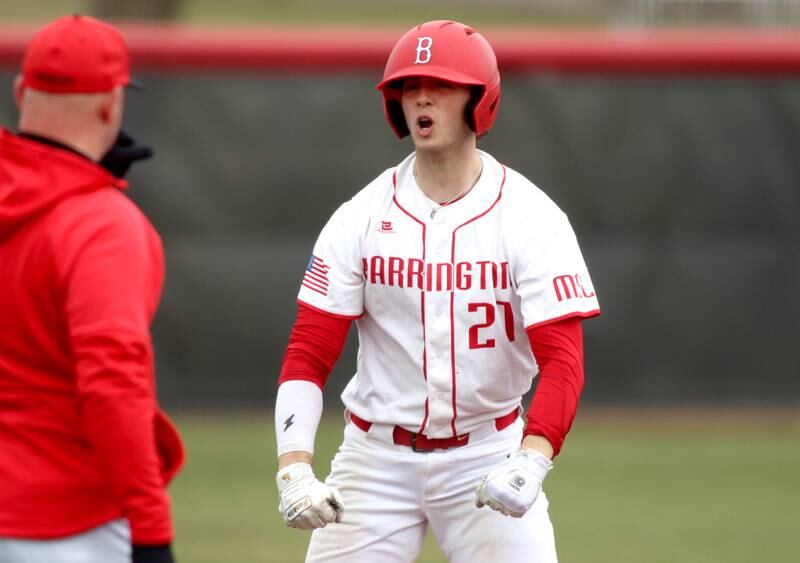Barrington’s Julian Ashley-Friedman celebrates a triple against Huntley in varsity baseball at Barrington Saturday.