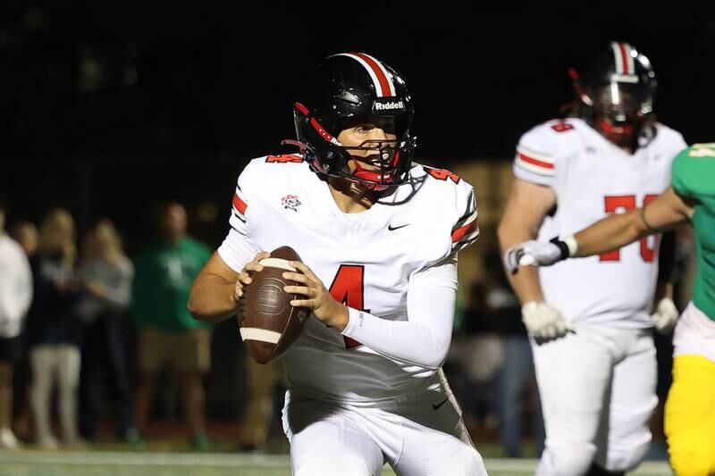 Lincoln-Way Central’s Drew Woodburn looks to pass against Providence on Friday, Sept. 6, 2024 in New Lenox.
