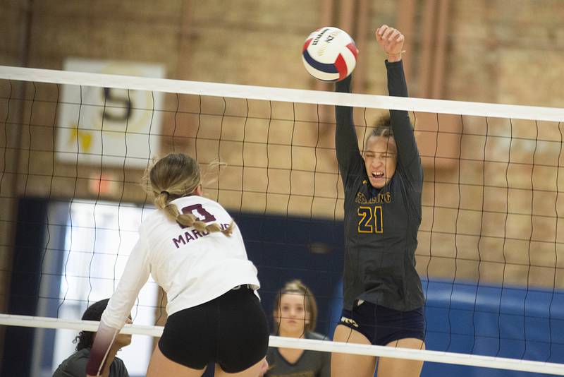 Sterling’s Kirra Gibson blocks a shot Thursday, Sept. 1, 2022 against Moline.