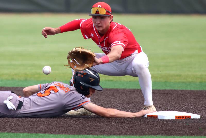 McHenry’s Landon Clements dives safely back to second base as Barrington’s Jackson Roberts fields the throw  in IHSA Class 4A Sectional Title Game baseball action at McHenry High School in McHenry on Saturday, June 7, 2025.