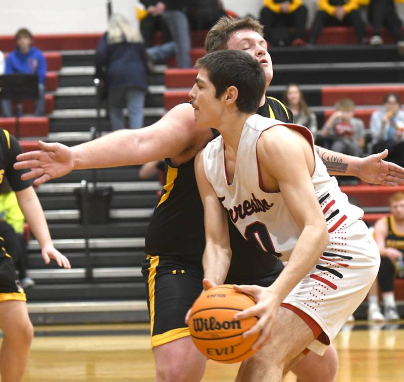 Forreston's Joseph Kolber makes a move to the basket against AFC on Saturday, Jan. 17, 2026 at Forreston High School.