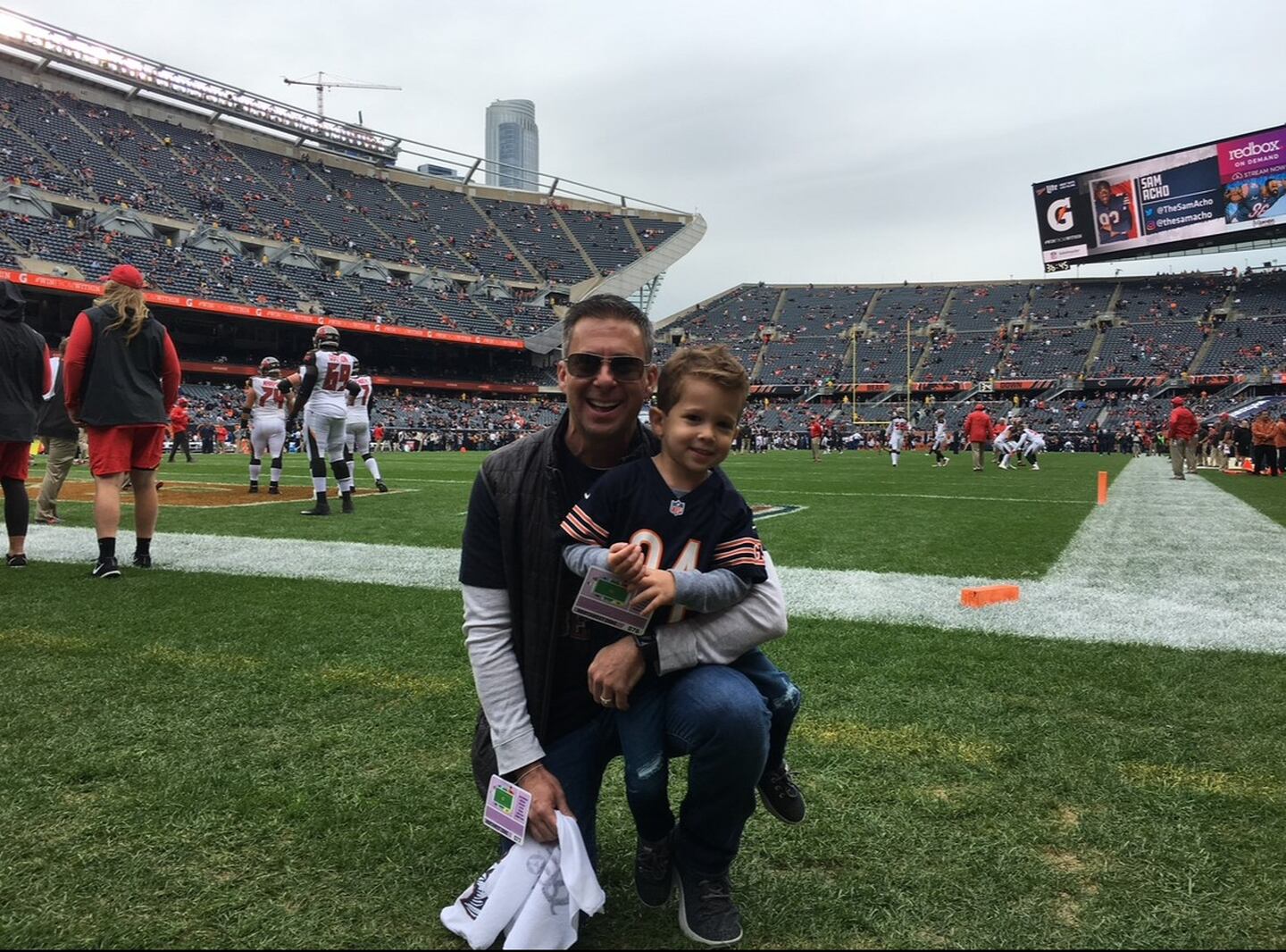 Shaw Local Bears columnist Marc Silverman with his son Mason at Mason's first Bears game in 2018.