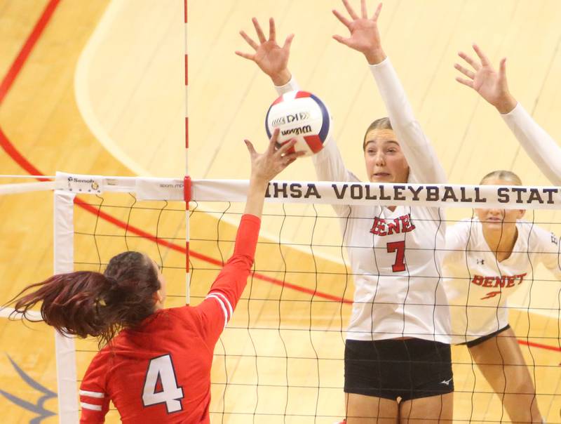 Huntley's Diellza Sejdini spike is blocked by Benet Academy's Audrey Asleson during the Class 4A State semifinal game on Friday, Nov. 15, 2024 at CEFCU Arena in Normal.