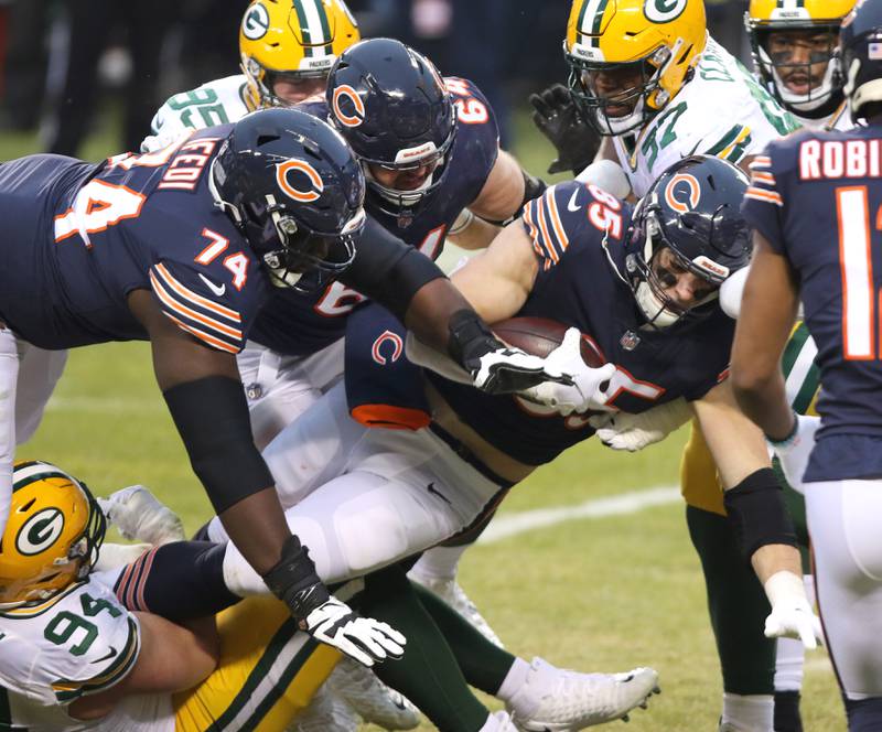 Chicago Bears tight end Cole Kmet (85) fights through the Packer defense after a catch near the end zone during their game Sunday at Soldier Field in Chicago.