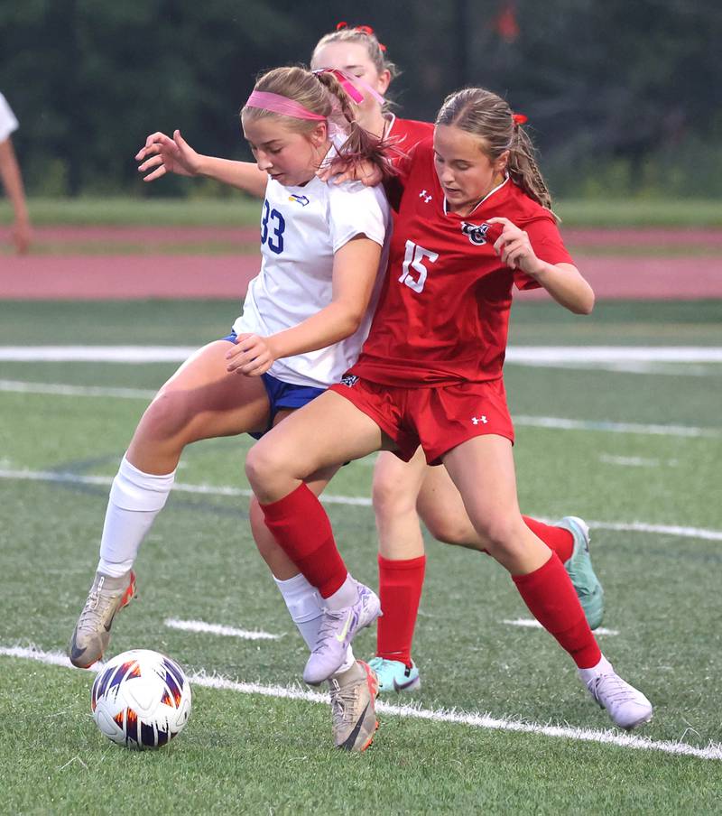 Johnsburg's Gabriella Kay (left) and Timothy Christian's Lucy Wilgenburg fight for possession Thursday, June 5, 2025, during their IHSA Class 1A state semifinal game at North Central College in Naperville.