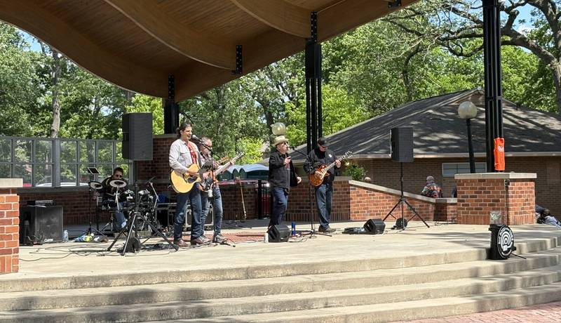 Big Boss and the Toes perform a mix of classic rock and modern hits during the Streator Food Truck Festival on Saturday, May 17, at City Park.