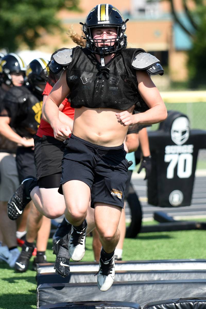 Herscher's Gavin Hull works through a footwork drill at football practice Wednesday, Aug. 13, 2025.