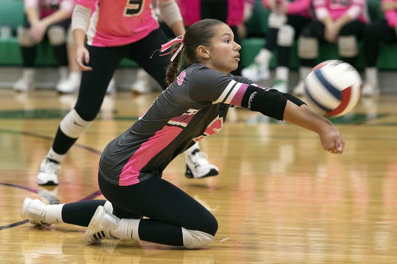 Rock Falls’ Elizabeth Lombardo digs at a ball against Stillman Valley Tuesday, October 8, 2024 at Rock Falls High School.