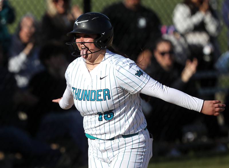 Woodstock North's Kylee Nicholson celebrates her game tying home run during a Kishwaukee River Conference softball game against Marengo on Tuesday, April 28 , 2026, at Woodstock North High School.