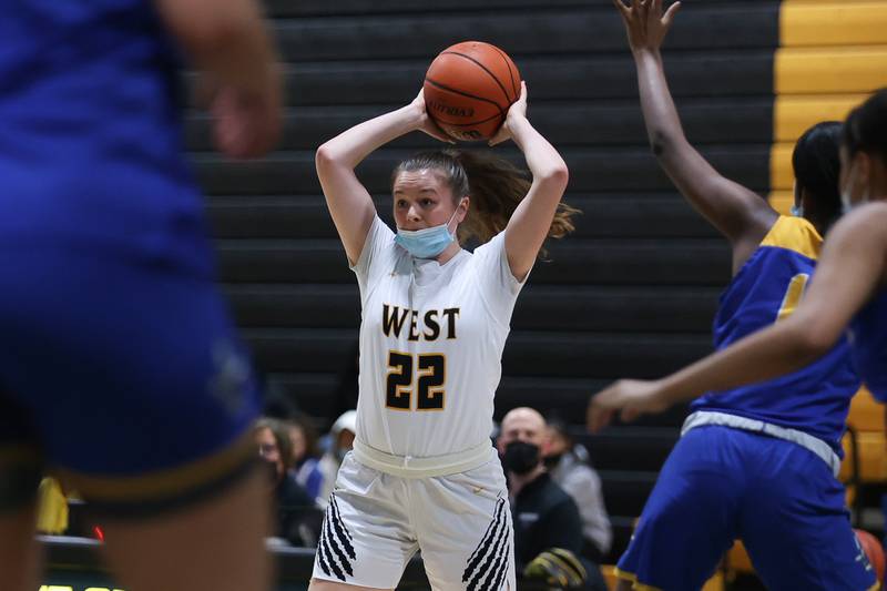 Joliet West’s Grace Walsh looks to pass against Joliet Central in the Class 4A Moline Regional semifinal. Tuesday, Feb. 15, 2022, in Joliet.