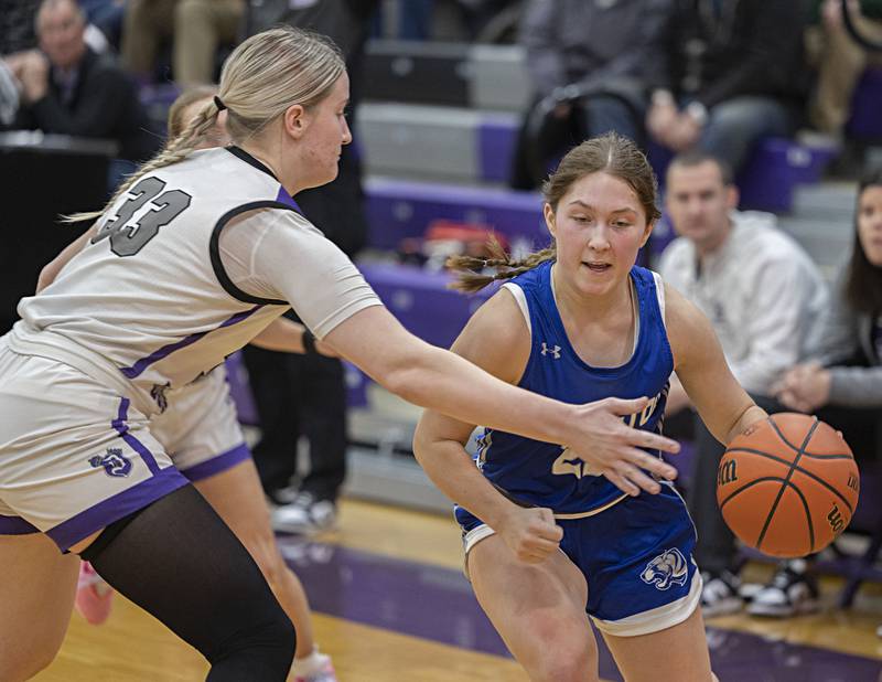 Princeton’s Miyah Fox dribbles against Dixon’s Jessie Pitman Thursday, Jan. 4, 2024 at Dixon High School.