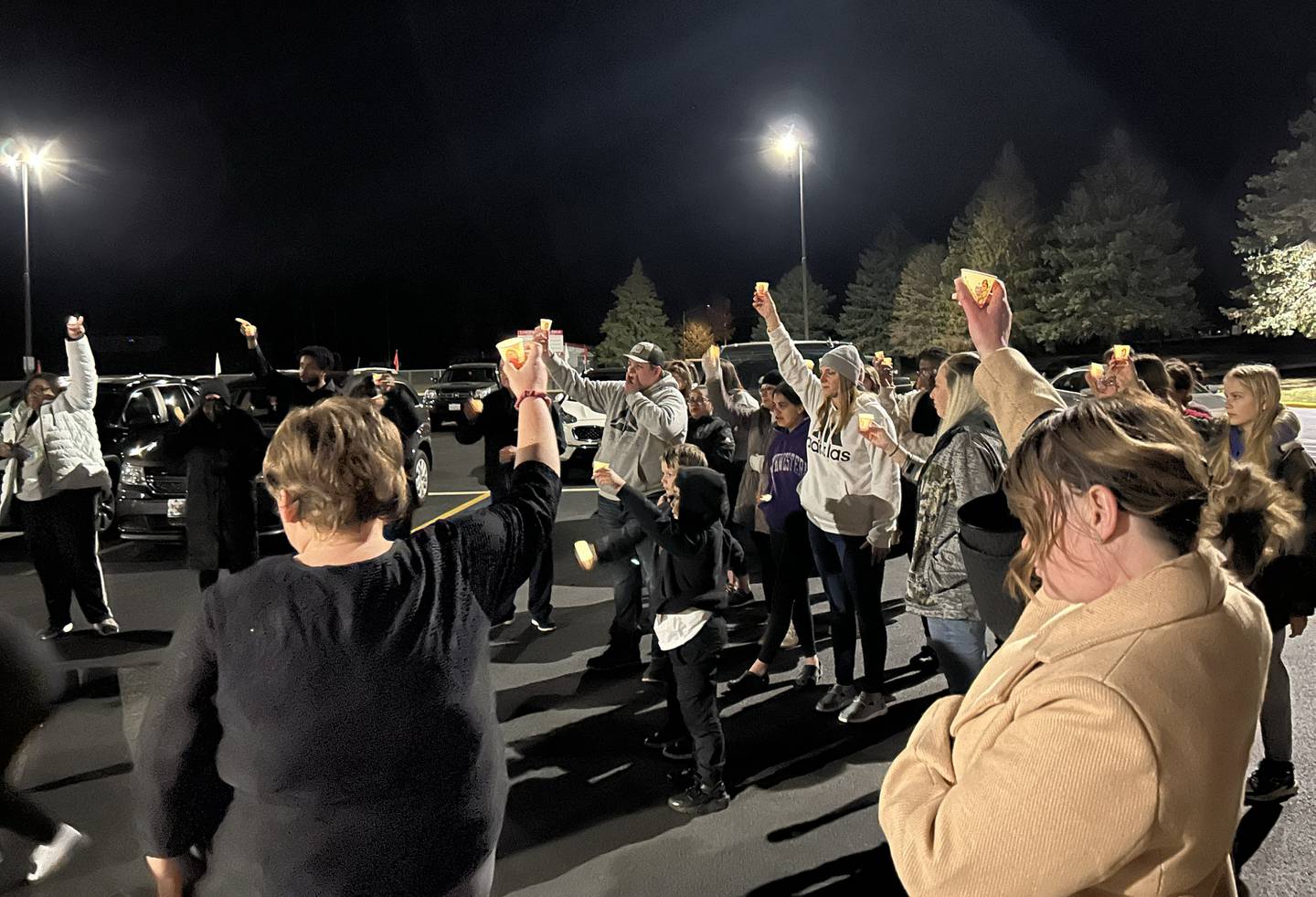 Family and friends held a candlelight vigil in memory of Jaedyn Hill, 16, on Sunday, Oct. 27, 2024 in the Blackhawk Center parking lot near the Oregon High School. Police say Hill was killed by her boyfriend in an apartment they shared in Ashton.