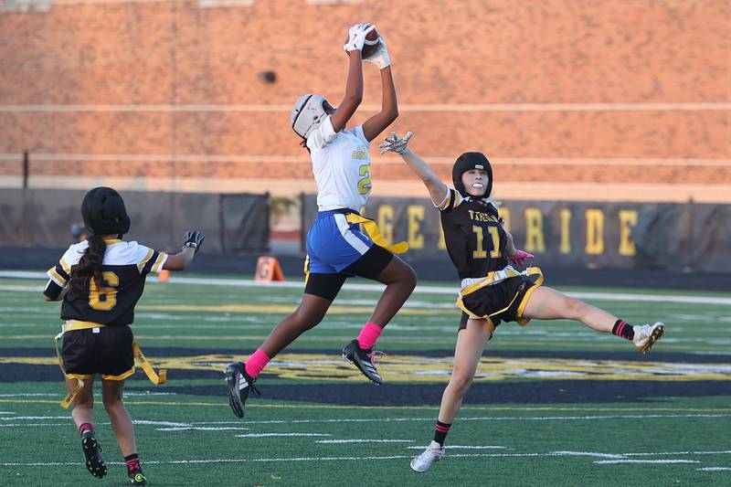 Joliet Central’s Georgianna Majors pulls in a pass against Joliet West on Wednesday, Oct. 2, 2024 in Joliet.