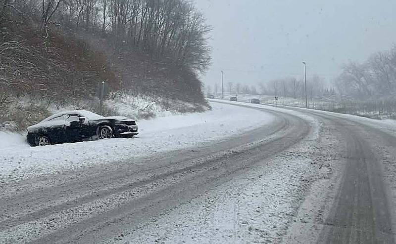 A car spins out in the ditch on Saturday, Nov. 29, 2025 along Route 6 just east of La Salle.