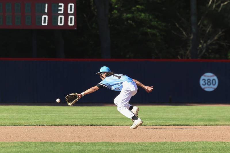 Kankakee's Anthony Andrade reaches for the ball at shortstop during the Kays' 8-4 loss to Clifton Central on Monday, May 11, 2026.