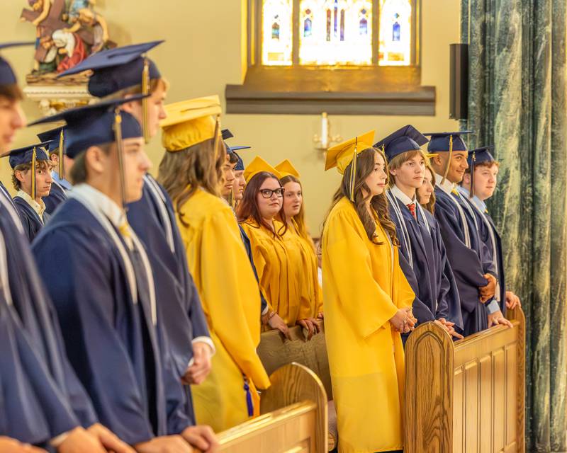 2026 Marquette Academy Graduates stand during ceremony on May 24, 2026 at St. Columba Church in Ottawa.