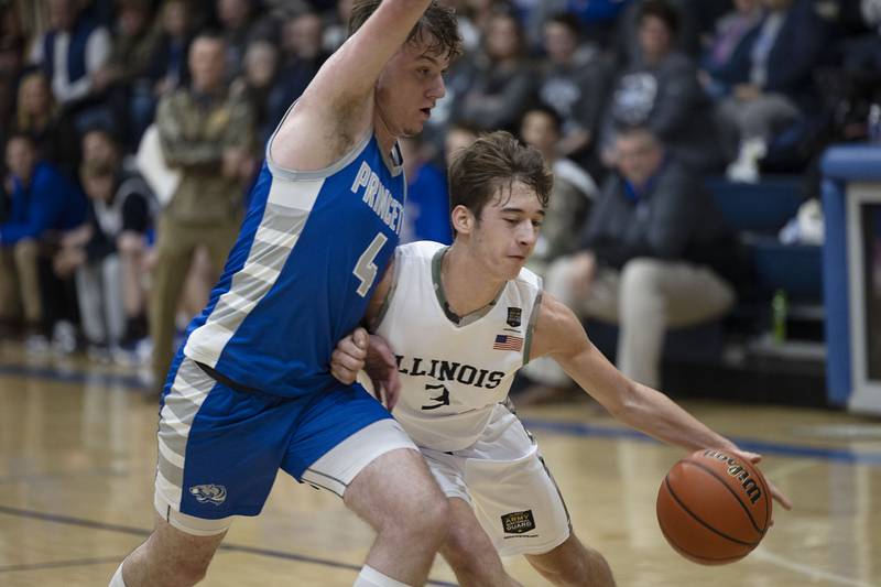 Newman’s Ayden Batten handles the ball against Princeton’s Korte Lawson Friday, Jan. 13, 2023.