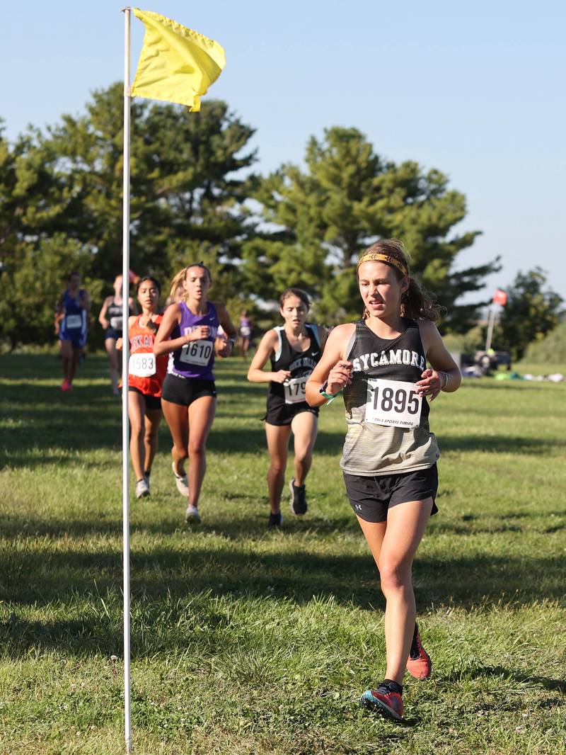 Sycamore's Hayley King makes a turn in the girls race Tuesday, Aug. 30, 2022, during the Sycamore Cross Country Invitational at Kishwaukee College in Malta.