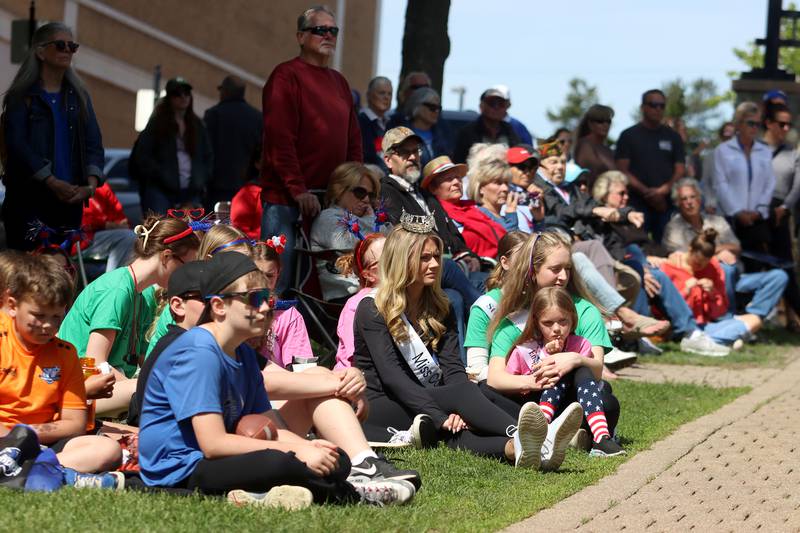 People crowd the square during a Memorial Day service and parade in downtown Woodstock on Monday, May 26, 2025.