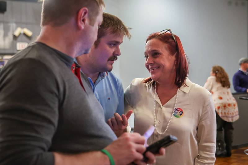 State representative candidate Amy “Murri” Briel (right) talks with Jedge (middle) and Steve Slothower on Tuesday, Nov. 5, 2024, at Alfano’s in Ottawa.