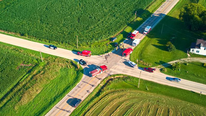 Seven people suffered injuries and were hospitalized in a two-car crash at Glidden and Baseline roads in Kingston Township Wednesday, July 17, 2024, DeKalb County Sheriff Andy Sullivan said. Multiple agencies responded (shown in this drone-captured image) and a portion of the roadway was temporarily closed.